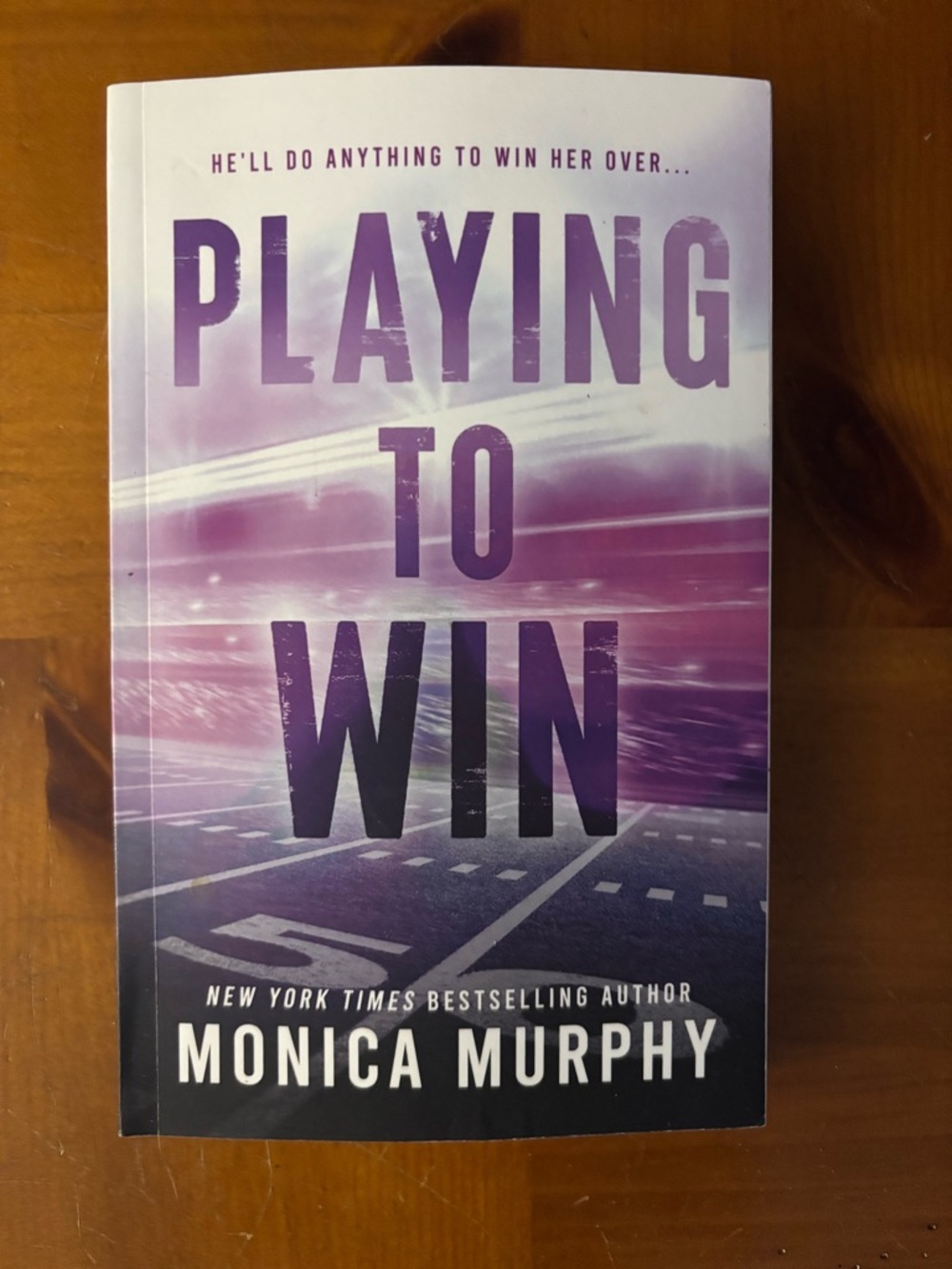 Playing to Win - Purple Paperback Romance Novel